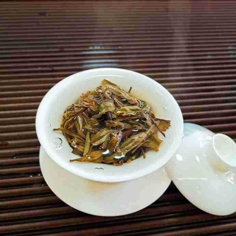 Premium Yunnan Puerh Tea Seventh Cake Raw Tea Yiwu Ma Hei Ancient Tree Raw Tea 357g Natural and additive-free Green tea 云南普洱茶七子饼生茶 易武麻黑古树生茶 357克