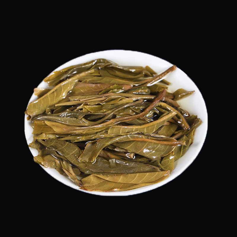 Yunnan Natural and Additive-free Puerh Tea 357g Daxueshan (Rui) Big Tree Old Tree 357g Puerh Tea Cake Chinese Green Tea 云南普洱茶 357克大雪山(瑞)大树 老树 357克普洱茶饼