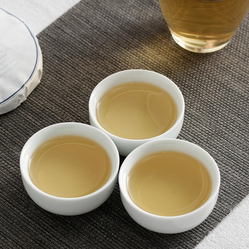 Yunnan Natural and additive-free Puerh Tea 100g Iceland Honey Rhythm Small Cake (Chong) Large Tree Puerh Raw Cake green tea 云南普洱茶 100克冰岛蜜韵小饼(崇)大树普洱生饼