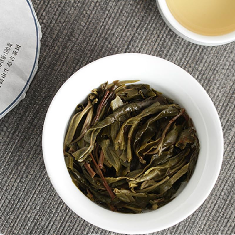 Yunnan Natural and additive-free Puerh Tea 100g Iceland Honey Rhythm Small Cake (Chong) Large Tree Puerh Raw Cake green tea 云南普洱茶 100克冰岛蜜韵小饼(崇)大树普洱生饼