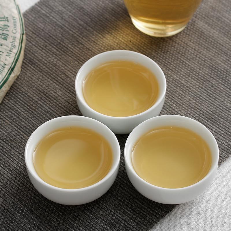 Yunnan Natural and Additive-free Puerh Tea Banzhang Yinhao Big Tree Old Tree Puerh Raw Cake 357g Qizi Cake Tea Chinese Green Tea 云南普洱茶 班章银毫大树老树普洱生饼 357克七子饼