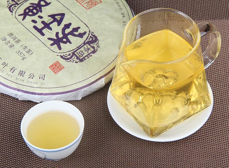 Natural and Additive-free Iceland Ancient Tree Tea 357g Gold Leaf Menghu Puerh Tea Raw Tea Yunnan Qizi Cake Green Tea 冰岛古树茶黄金叶勐库普洱茶生茶