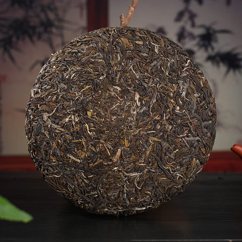 Natural Yunnan Puerh Tea Yiwu Ancient Trees Early Spring 357g Qizi Cake Puerh Raw Cake Orchid Fragrance Healthy and Delicious Green Tea 云南普洱茶 易武古树 早春 357g七子饼普洱生饼