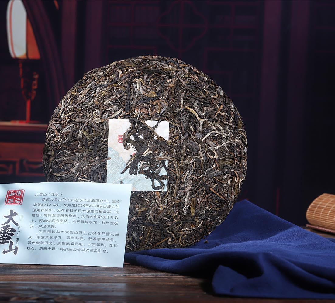 Yunnan Natural and Additive-free Puerh Tea 357g Daxueshan (Rui) Big Tree Old Tree 357g Puerh Tea Cake Chinese Green Tea 云南普洱茶 357克大雪山(瑞)大树 老树 357克普洱茶饼