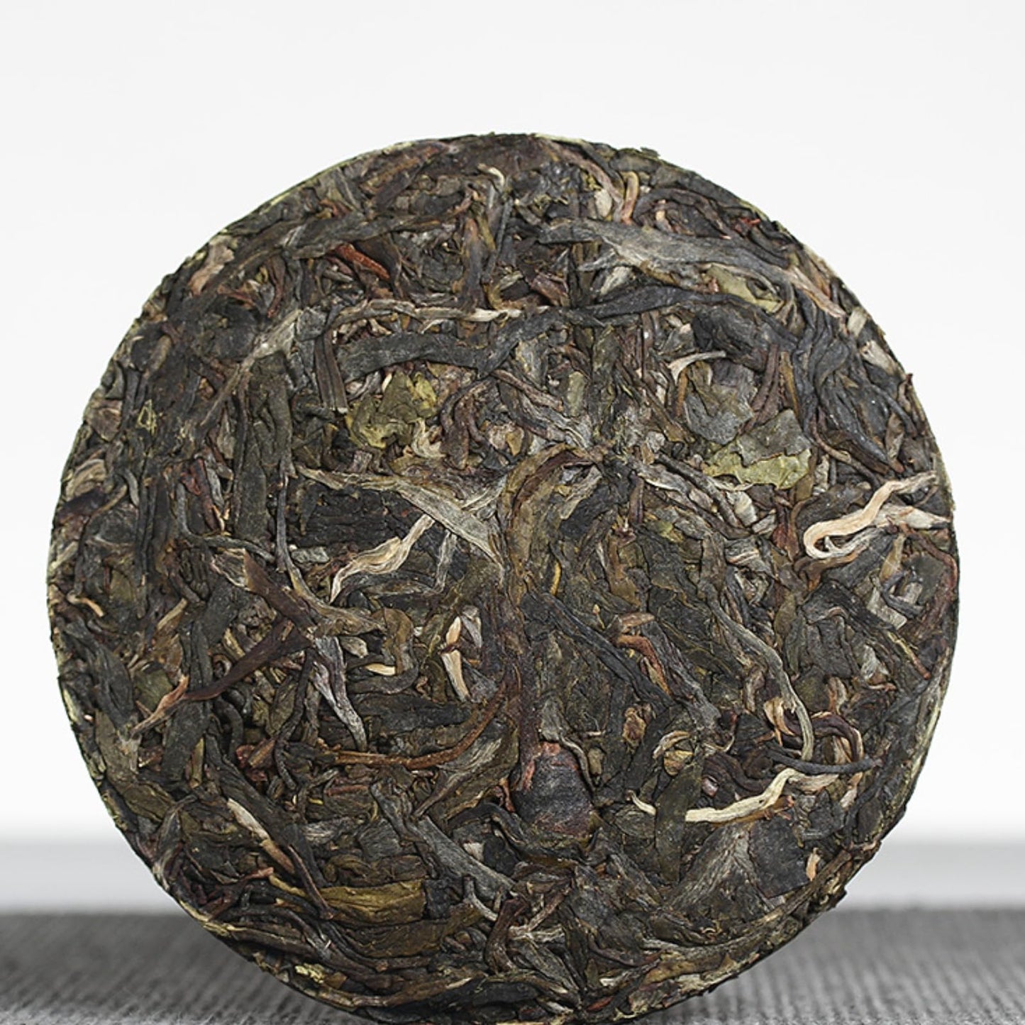 Yunnan Natural and additive-free Puerh Tea 100g Iceland Honey Rhythm Small Cake (Chong) Large Tree Puerh Raw Cake green tea 云南普洱茶 100克冰岛蜜韵小饼(崇)大树普洱生饼