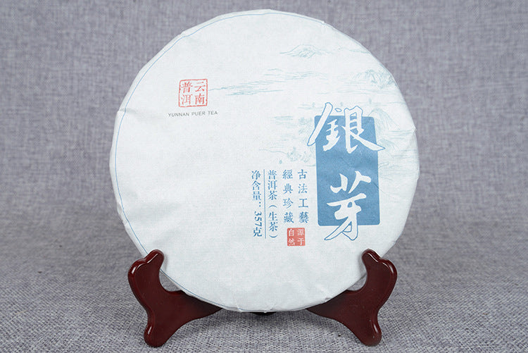 China Yunnan Pu'er Tea Ancient Tree Raw Tea Cake 357g Silver Leaf Qizi Cake Tea Spring Tea Green Tea