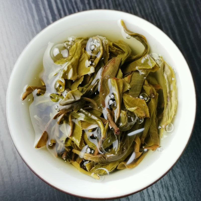 China Yunnan Mengku Tea 357g Early Spring Raw Pu'er Tea Green Tea Yunnan Tea Cake