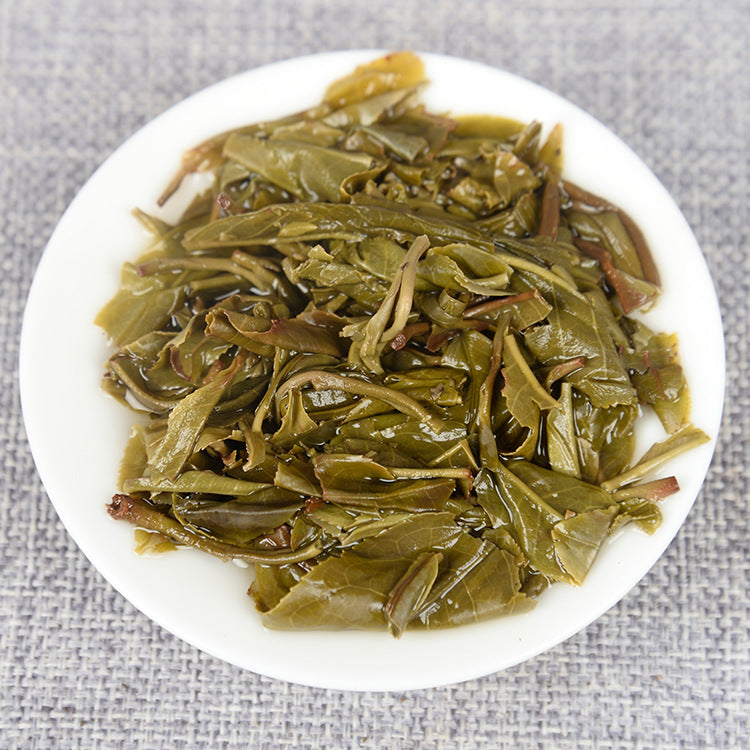 Yunnan Pu'er Tea Early Spring Raw Tea 100g Cake Tea Icelandic Raw Tea Spring Tea Green Tea