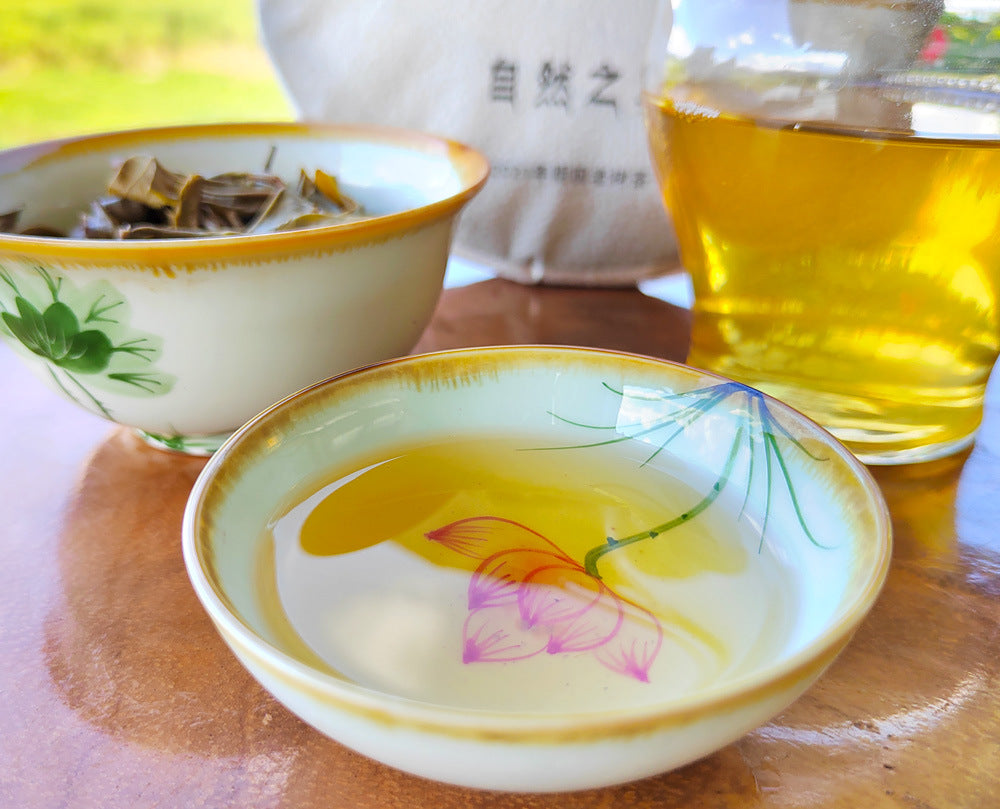 Icelandic Pu'er Tea Ancient Tree First Spring Pu'er Raw Tea 357g Mengku Old Tree Yunnan Qizi Cake Green Tea