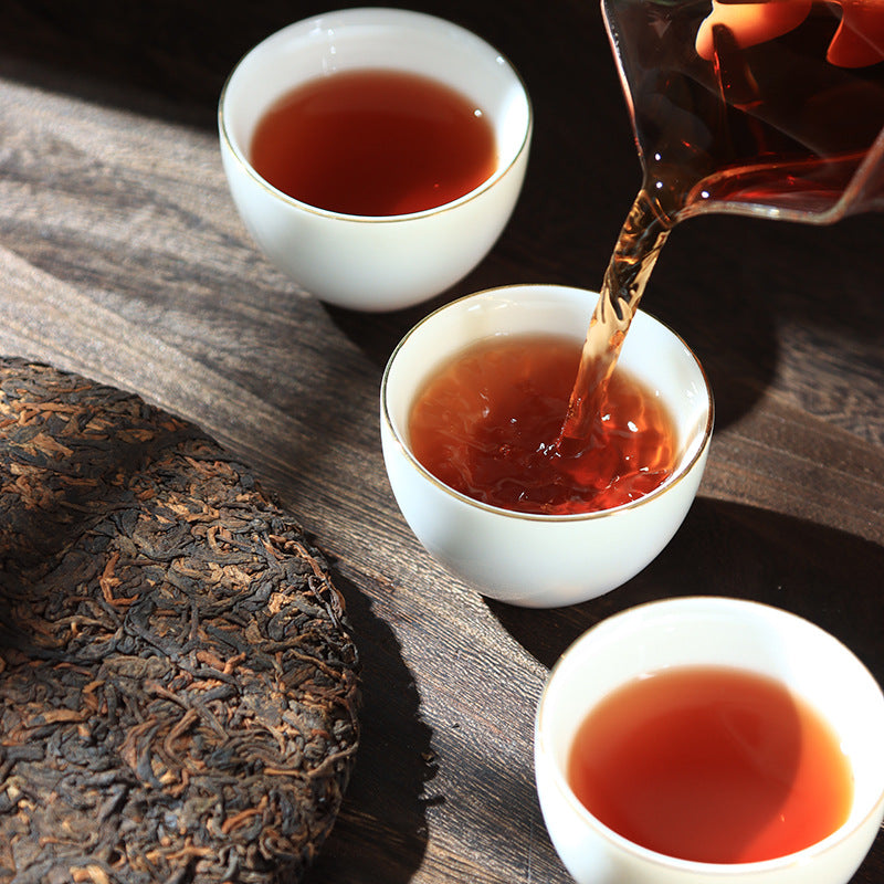 Yunnan Pu-erh tea leaves Yiwu Golden Bud 357g Seven Sons Cake Ripe Tea Black tea Cake Ripe Tea Golden Bud Ancient Tree Material