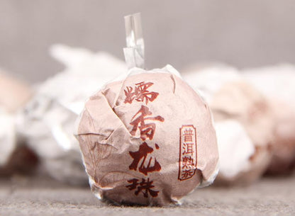 Yunnan Natural and Additive-free Glutinous Rice Fragrance Pu-erh Tea Pu-erh Ripe Tea Black Tea Longzhu Individual packaging Pu-erh Tea Tuo Tea 糯米香普洱茶 普洱熟茶龙珠500g
