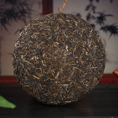 Natural Yunnan Puerh Tea Yiwu Ancient Trees Early Spring 357g Qizi Cake Puerh Raw Cake Orchid Fragrance Healthy and Delicious Green Tea 云南普洱茶 易武古树 早春 357g七子饼普洱生饼