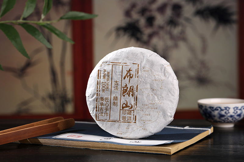 Pu-erh Tea 100g Raw Tea Cake Brown Mountain Qiao Green tea Mu Ancient Tree First Spring Raw Tea Cake