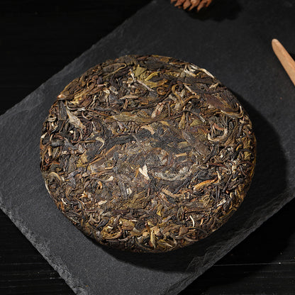 Pu-erh Tea 100g Raw Tea Cake Brown Mountain Qiao Green tea Mu Ancient Tree First Spring Raw Tea Cake